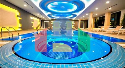 Квартира 1+1 на первой линии в районе Махмутлар