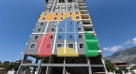 Квартира 1+1 в новом доме в районе Махмутлар