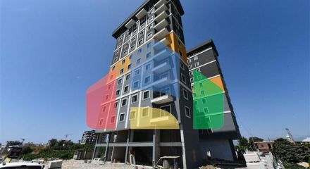 Квартира 1+1 в новом доме в районе Махмутлар