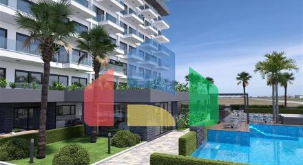 Квартира плануванням 1 + 1 в новому споруджуваним сучасному комплексі в Махмутлар