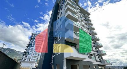 Квартира плануванням 1 + 1 в споруджуваному будинку в районі Махмутлар