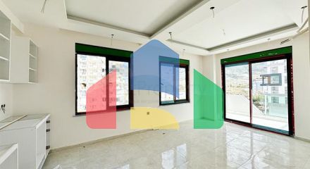 Квартира плануванням 1 + 1 в споруджуваному будинку в районі Махмутлар