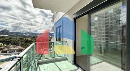 Квартира плануванням 1 + 1 в споруджуваному будинку в районі Махмутлар