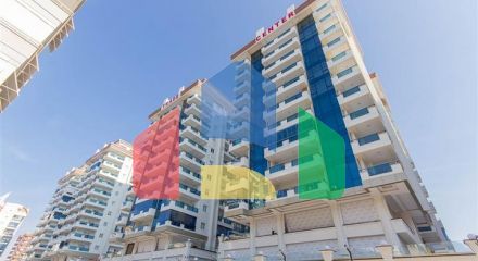 Простора квартира 2+1 в новому комплексі району Махмутлар