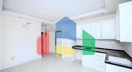 Новый квартира 1+1 в районе Махмутлар