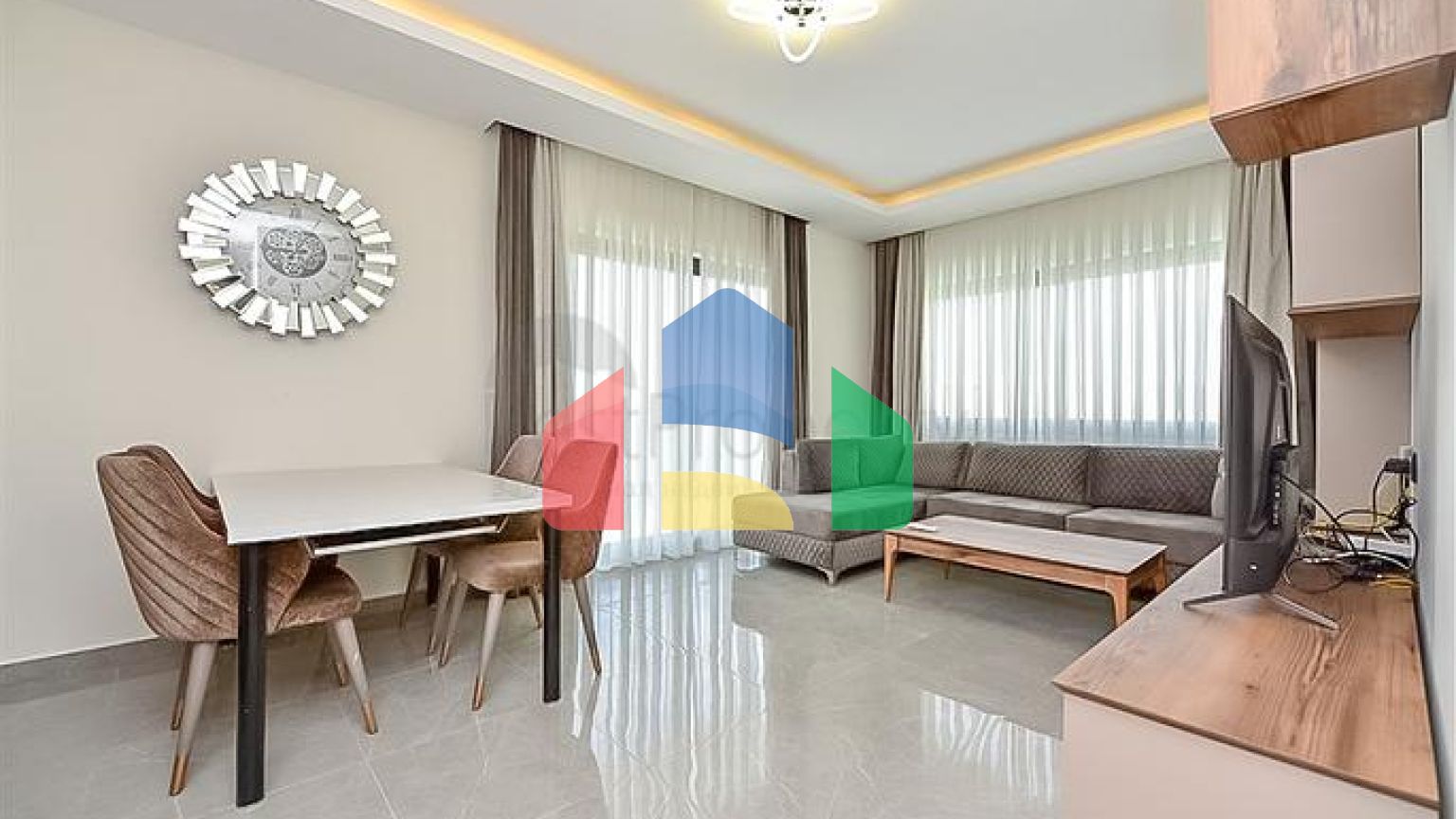 Трехкомнатная квартира в районе Махмутлар с видом на горы