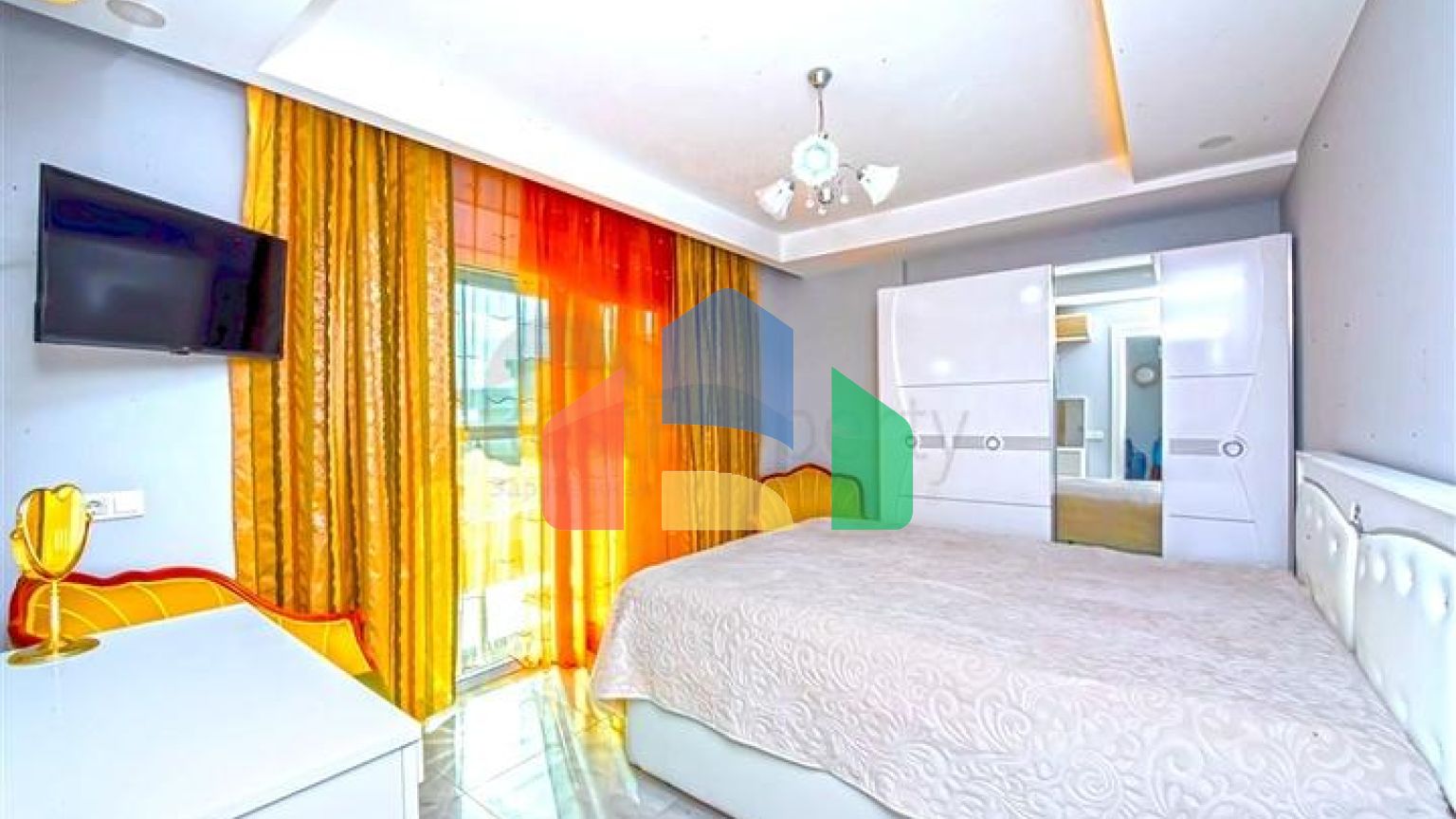 Просторная двухкомнатная квартира в Махмутларе