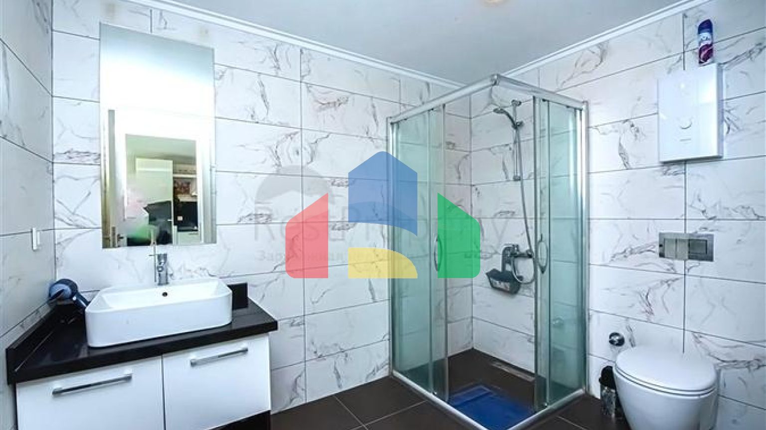 Просторная двухкомнатная квартира в Махмутларе