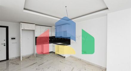 Квартира 1+1 в новом доме в районе Махмутлар