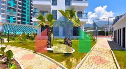 Квартира 1+1 в новом доме в районе Махмутлар