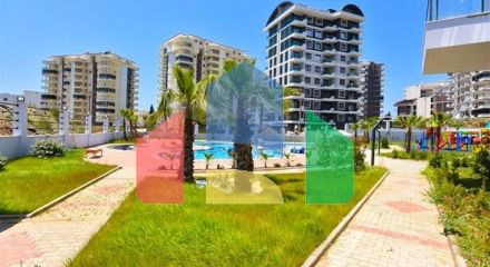 Квартира 1+1 в новом доме в районе Махмутлар