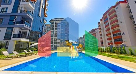 Квартира 1 + 1 в новому комлпексе в районі Махмутлар