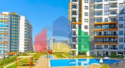Квартира 1 + 1 в новому комлпексе в районі Махмутлар
