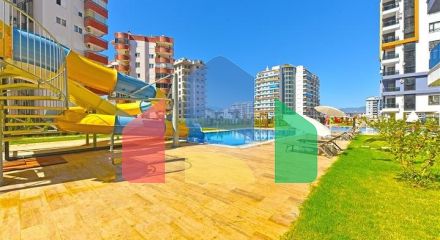 Квартира 1 + 1 в новому комлпексе в районі Махмутлар