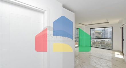 Квартира 1+1 с видом на горы и море в районе Махмутлар