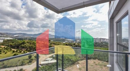 Квартира 1+1 с видом на горы и море в районе Махмутлар