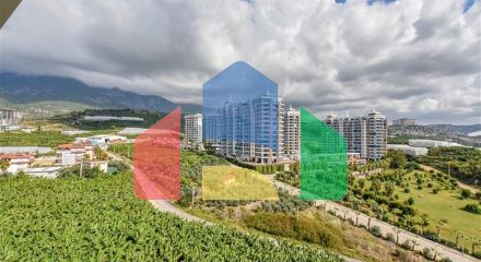 Квартира 1+1 с видом на горы и море в районе Махмутлар