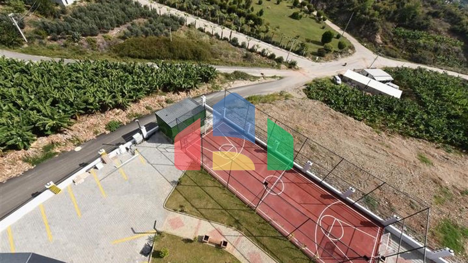 Квартира 1+1 с видом на горы и море в районе Махмутлар