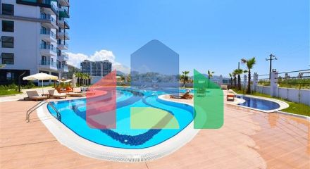 Квартира 1+1 с видом на горы и море в районе Махмутлар