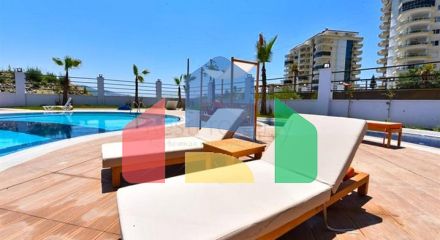 Квартира 1+1 с видом на горы и море в районе Махмутлар