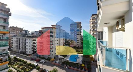 Мебльована квартира плануванням 1+1 в районі Махмутлар