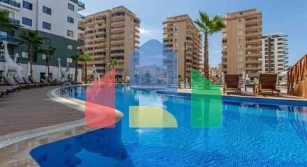 Modern furnished 2+1 apartment with resort infrastructure in the center of Mahmutlar