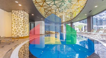 Modern furnished 2+1 apartment with resort infrastructure in the center of Mahmutlar