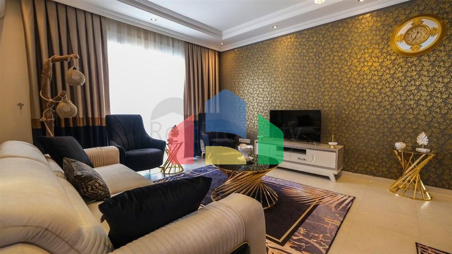 Трехкомнатная квартира в районе Махмутлар