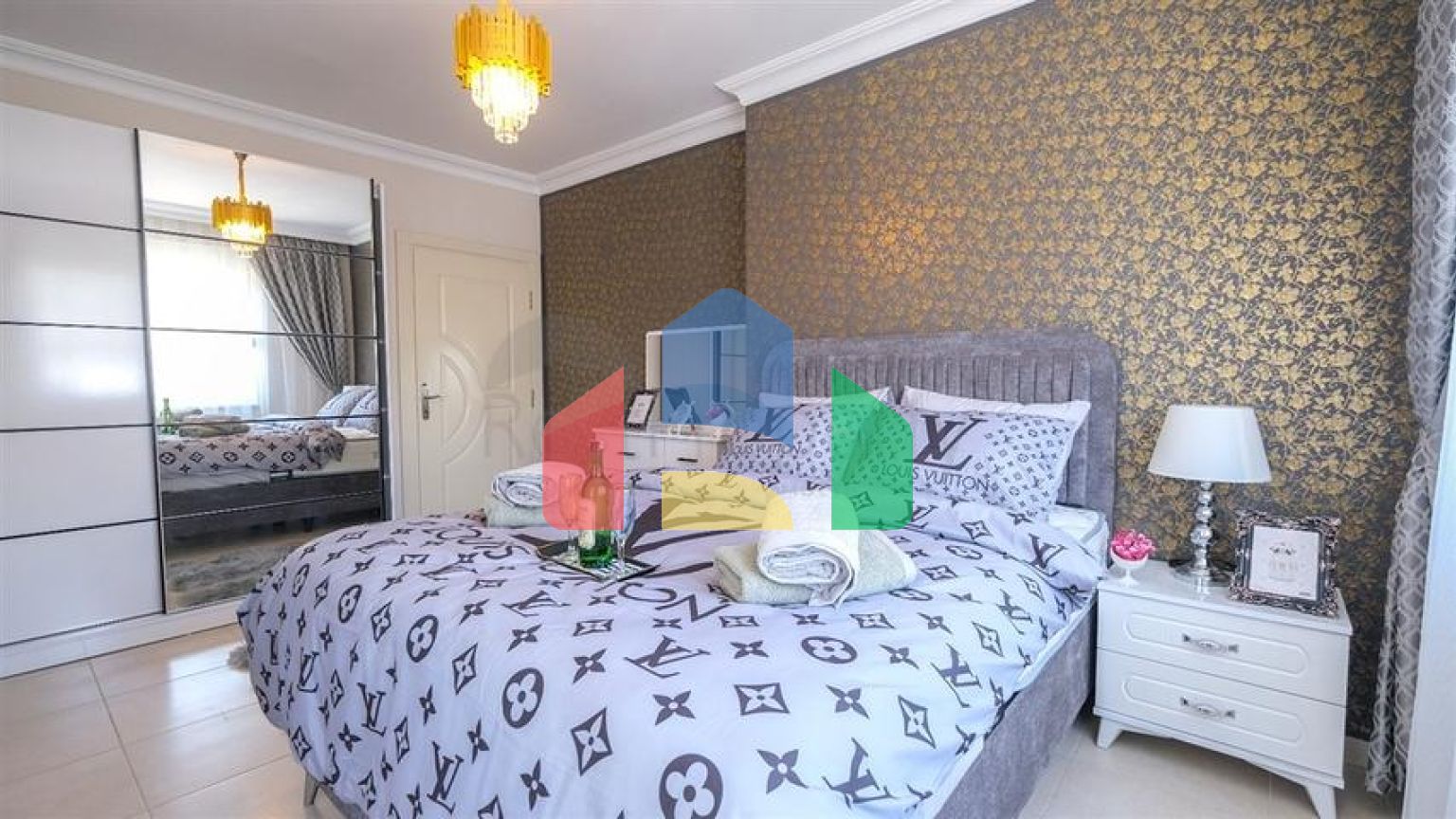 Трехкомнатная квартира в районе Махмутлар