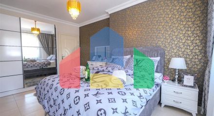 Трехкомнатная квартира в районе Махмутлар Трехкомнатная квартира в районе Махмутлар