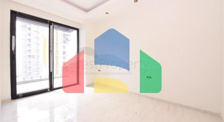 Квартира 1+1 на первой береговой линии в Махмутларе