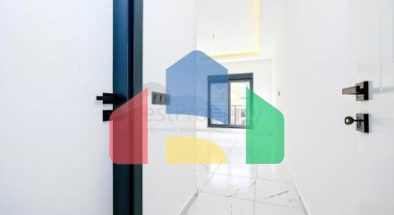 Світла квартира 2+1 в сучасному житловому будинку в районі Махмутлар