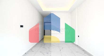 Світла квартира 2+1 в сучасному житловому будинку в районі Махмутлар