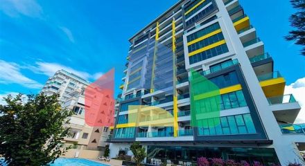 Двокімнатна квартира 1 + 1 з розвиненою інфраструктурою в районі Махмутлар