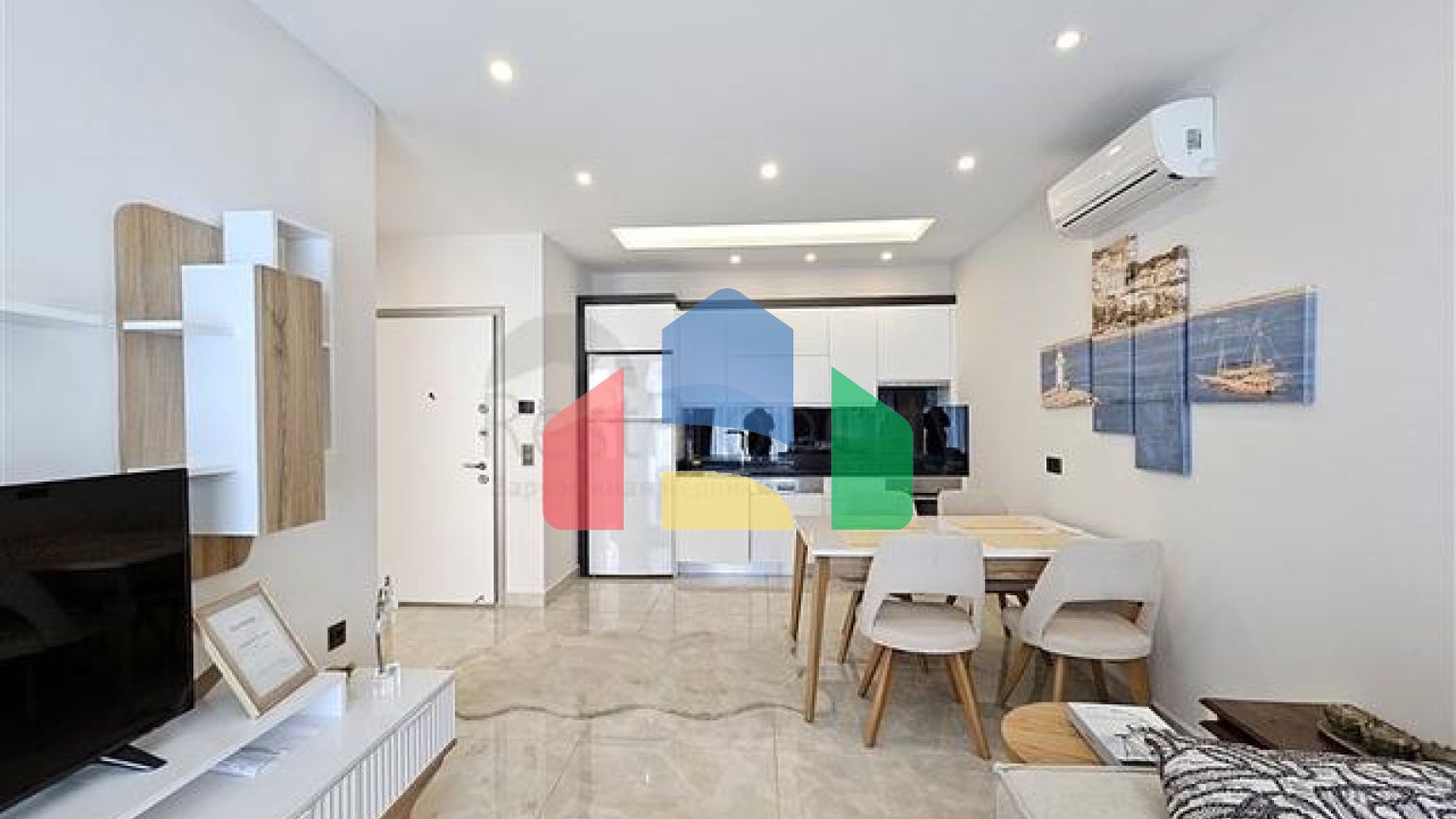 Двокімнатна квартира 1 + 1 з розвиненою інфраструктурою в районі Махмутлар