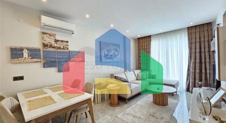 Двокімнатна квартира 1 + 1 з розвиненою інфраструктурою в районі Махмутлар