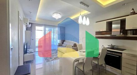 Світла квартира 1 + 1 на високому поверсі в районі Махмутлар