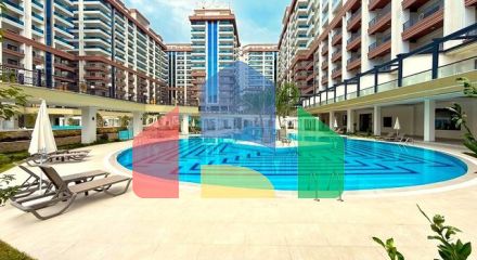 Просторная квартира с современным дизайном в Махмутларе