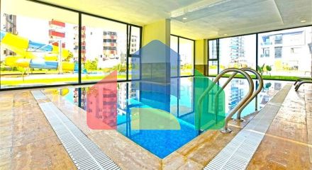 Современная квартира 1+1 с богатой инфраструктурой в районе Махмутлар