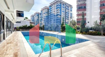 Квартира 1+1 с полной инфраструктурой комплекса в районе Махмутлар