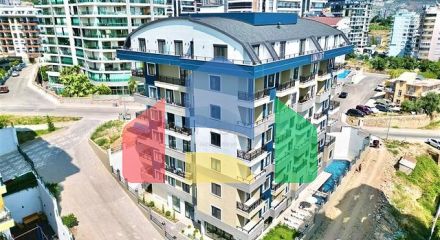 Затишна квартира 1 + 1 в сучасному будинку в Махмутларі