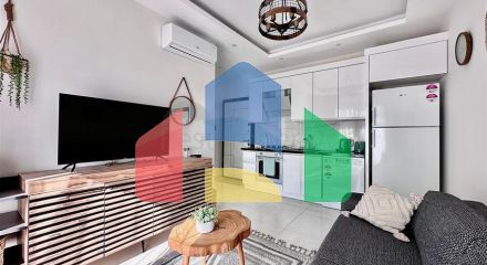 Затишна квартира 1 + 1 в сучасному будинку в Махмутларі