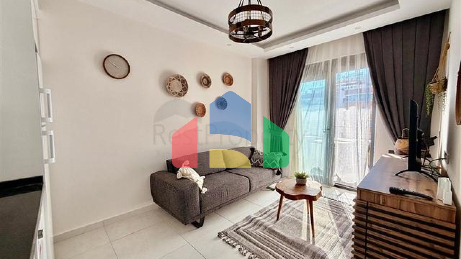 Затишна квартира 1 + 1 в сучасному будинку в Махмутларі