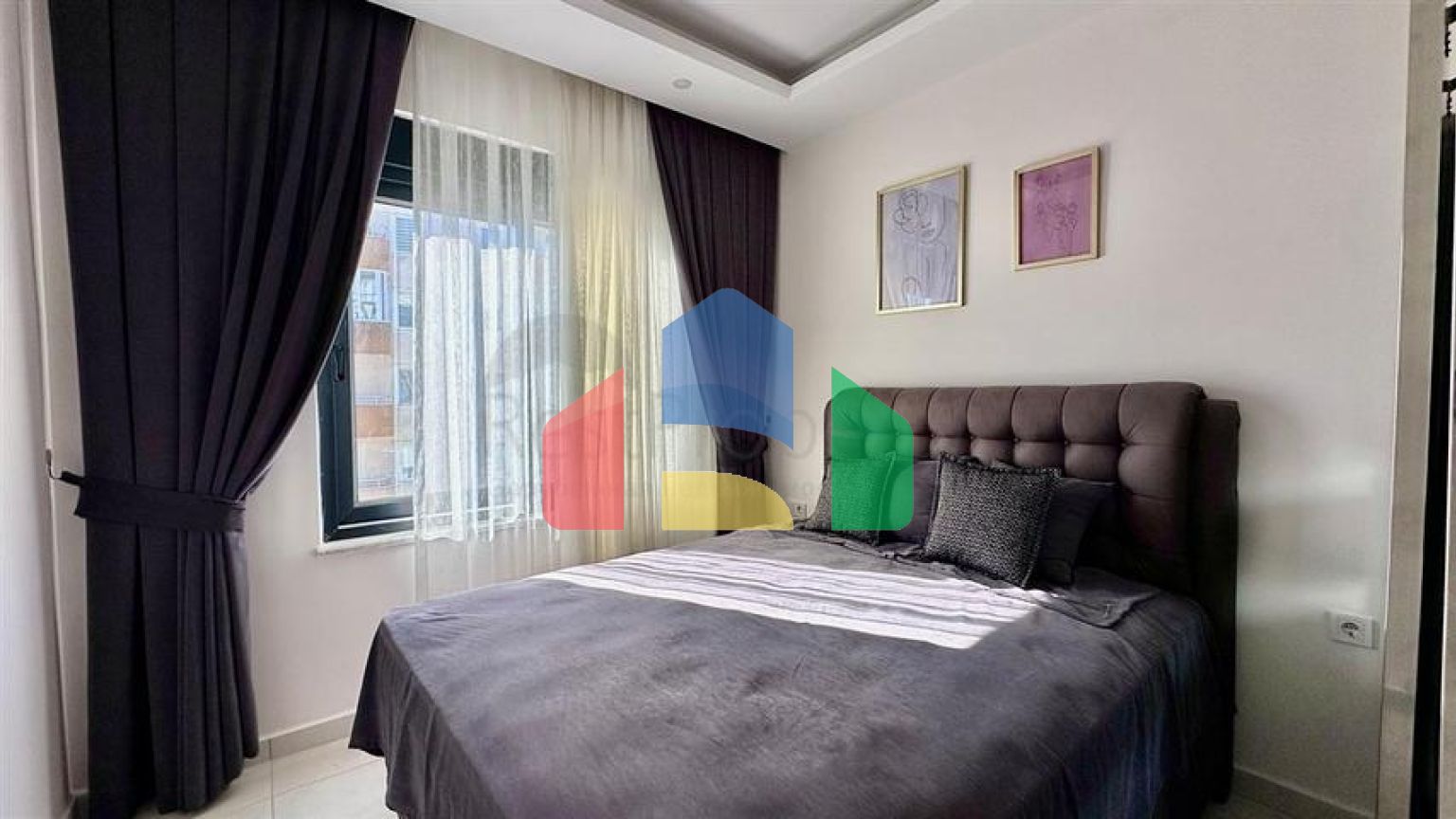 Затишна квартира 1 + 1 в сучасному будинку в Махмутларі