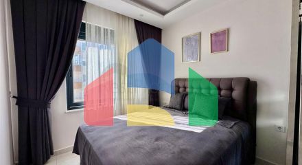 Затишна квартира 1 + 1 в сучасному будинку в Махмутларі