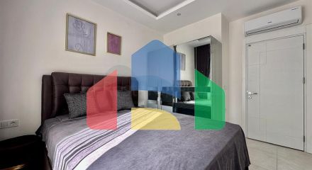 Затишна квартира 1 + 1 в сучасному будинку в Махмутларі