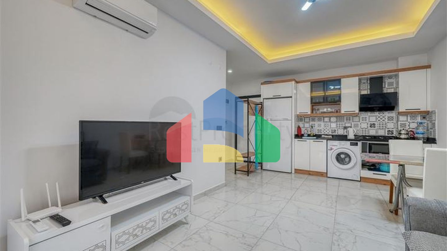 Современная меблированная квартира в новом комплексе в Махмутларе