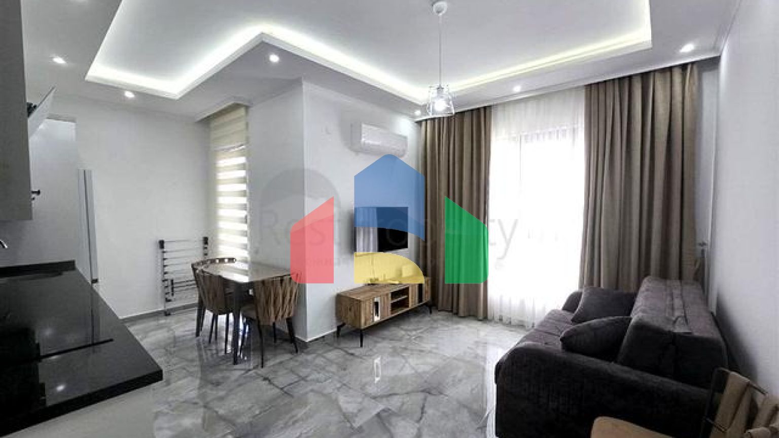 Квартира 1+1 с инфраструктурой в районе Махмутлар