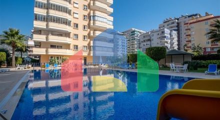 Двухкомнатная квартира с удобной планировкой в районе Махмутлар