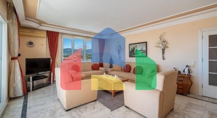 Двухкомнатная квартира с удобной планировкой в районе Махмутлар